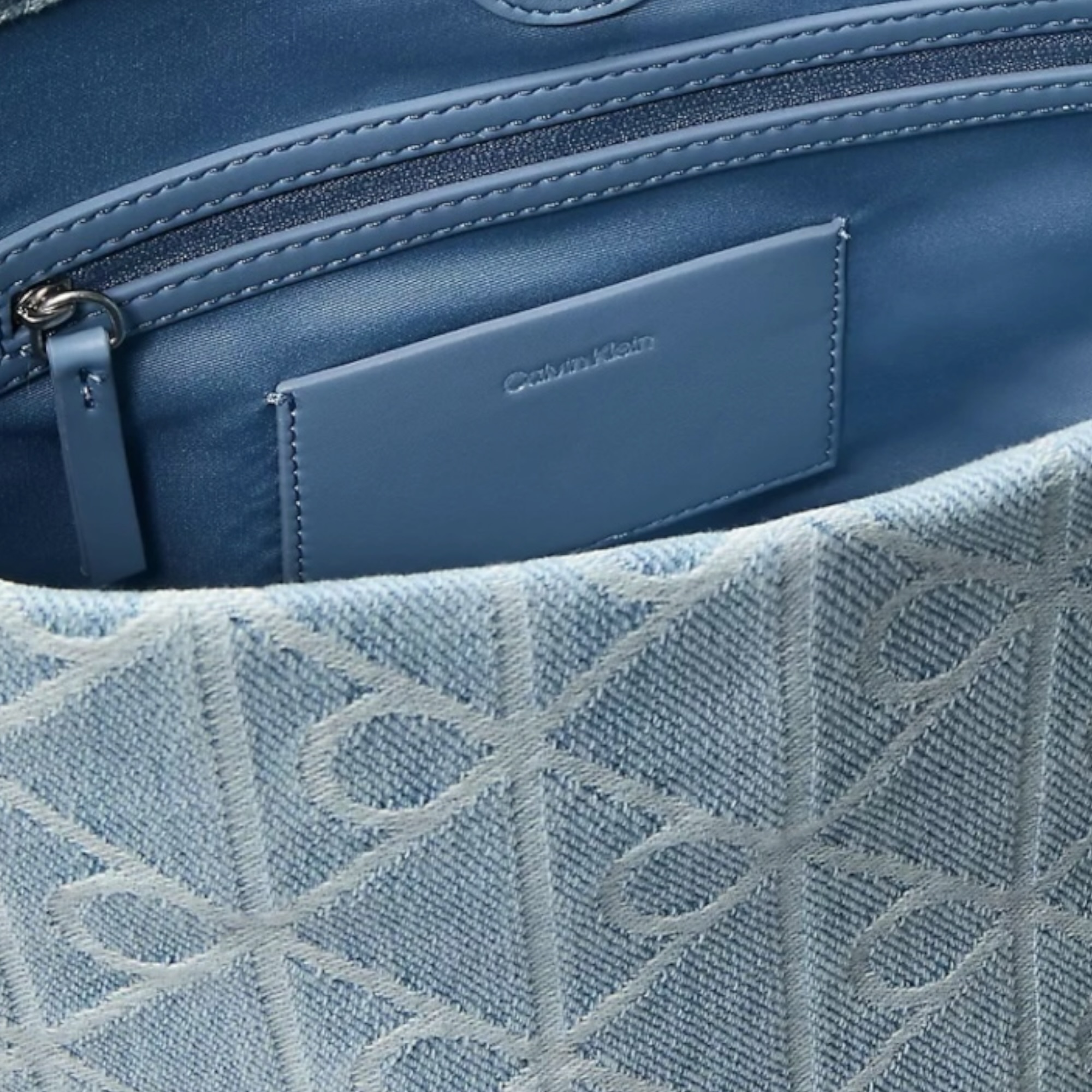 תיק CALVIN KLEIN AOP DENIM BUCKET